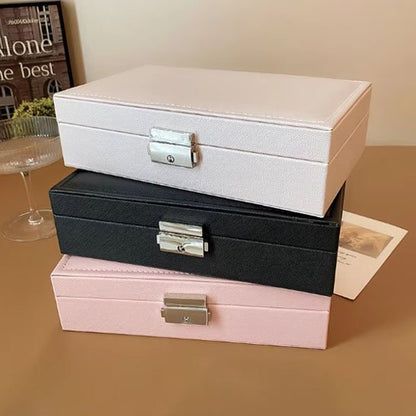 Boite a bijoux beige noir rose superposés