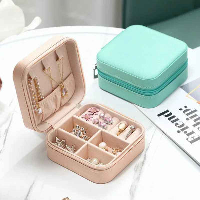 boite a bijoux voyage rose avec bijoux organiser