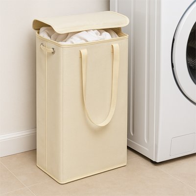 Panier à linge sale beige installer dans salle de bain