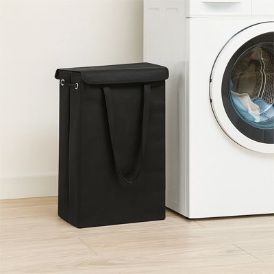 Panier à linge sale noir installer proche du lave vaisselle
