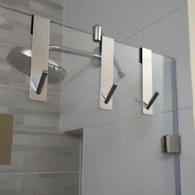 porte serviette gris suspendu paroi de douche sans viser