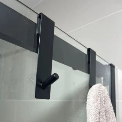 porte serviette noir suspendu paroi de douche