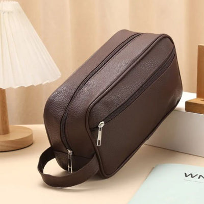Trousse de toilette homme marron fermé avec poignée