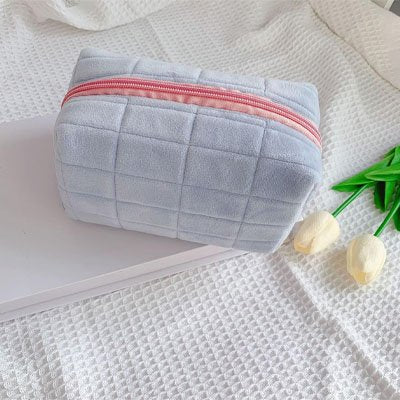 Trousse maquillage bleu en tissu